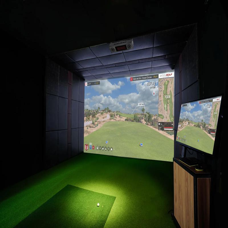 AccuGOLF Hawkeye Launch Monitor corner view of golf room with simulator.