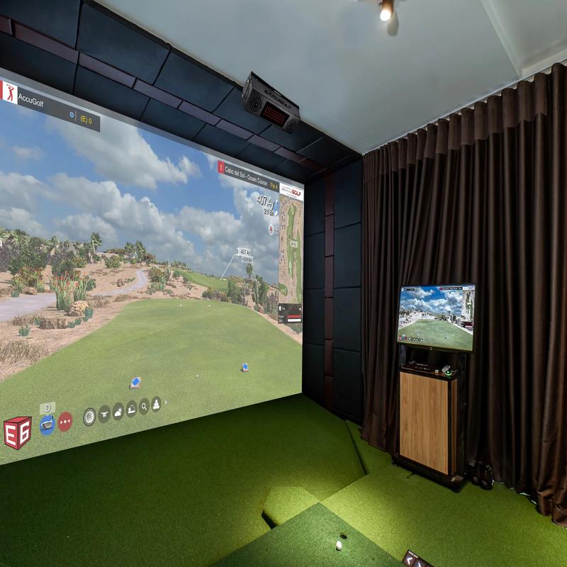 AccuGOLF Hawkeye Launch Monitor side view of golf room with simulator.