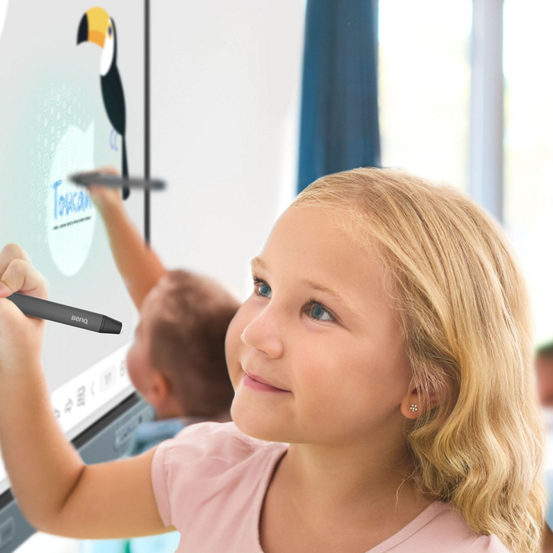 BenQ Board Pro 4K Interactive Display a young student writing on the board during a classroom activity.