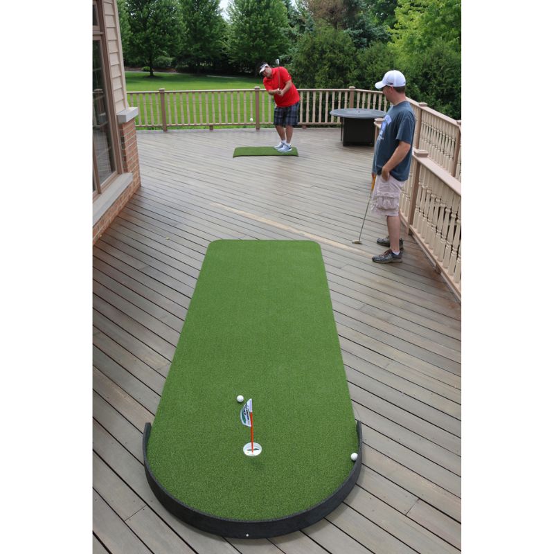 Big Moss Golf Commander Patio Series Putting &amp; Chipping Green in 15x3 foot option with golfer chipping.