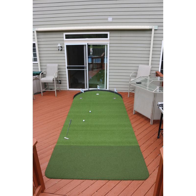 Big Moss Golf Commander Patio Series Putting &amp; Chipping Green in 15x6 foot option with flag sticks.