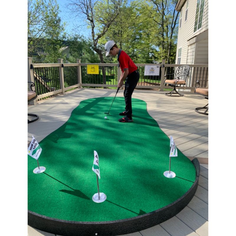 Big Moss Golf The Admiral V2 putting green with golfer putting.