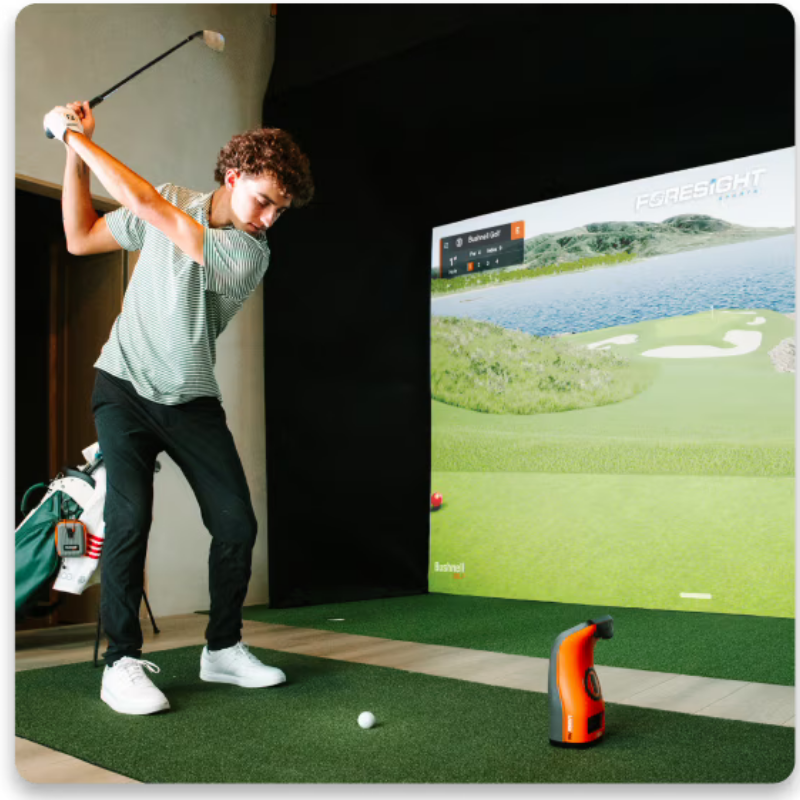 Bushnell Golf Launch Pro Circle B Edition Launch Monitor boy swinging.