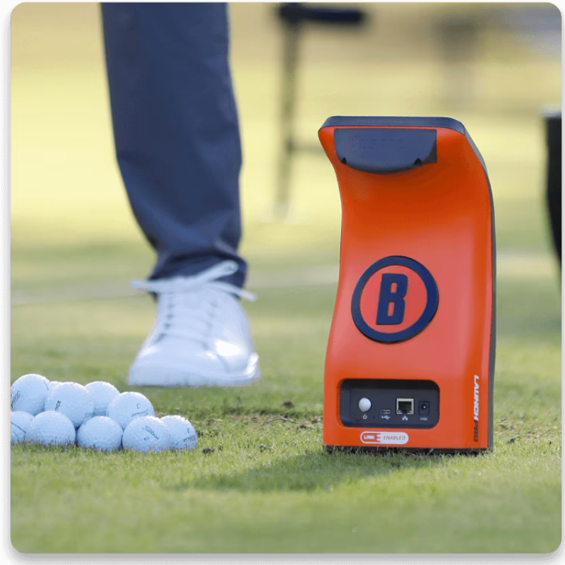 Bushnell Golf Launch Pro Circle B Edition Launch Monitor used outdoors.