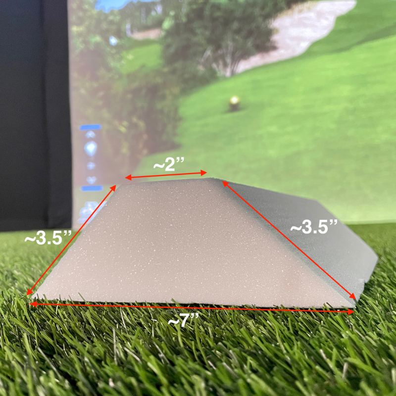 Carl&#39;s Place Foam Inserts for DIY Golf Simulator Enclosure displayed on a piece of turf with dimensions.