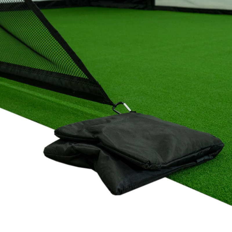 Sandbags with Carl&#39;s Place Net Wall Extensions for Golf Simulator Enclosures.