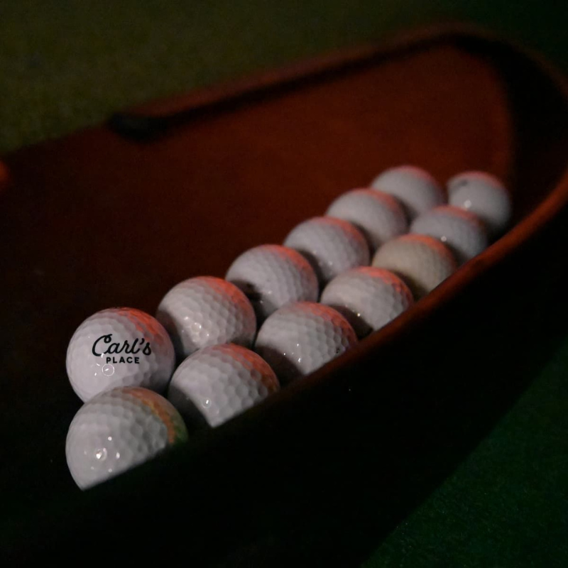 Carl&#39;s Place Golf Ball Tray close view with balls.