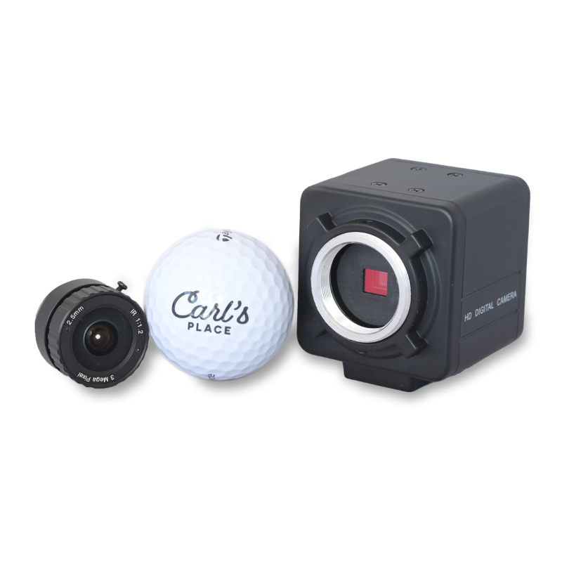 Carl&#39;s Place Golf Swing Camera with lens and golf ball.
