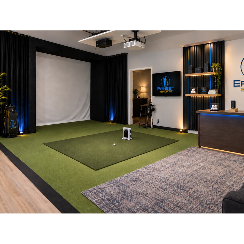 Ernest Sports Tour Plus 2.0 on a hitting mat in a golf simulator bay.