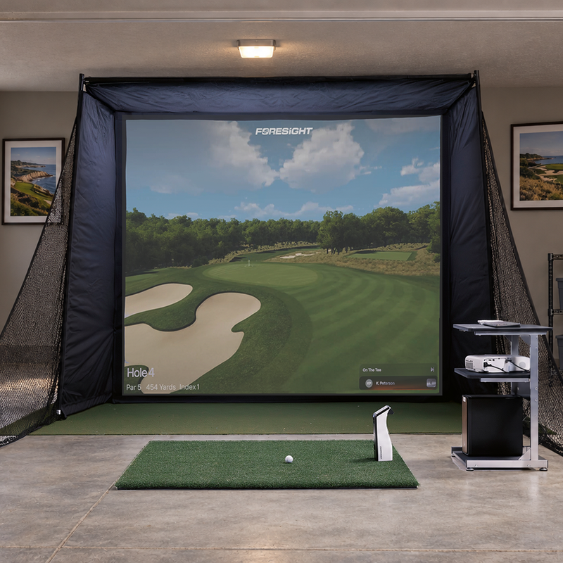 Foresight Sports GC2 Launch Monitor in a garage golf simulator.