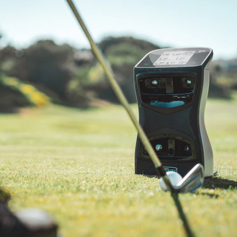 Foresight Sports GCQuad Launch Monitor with golf ball and club.