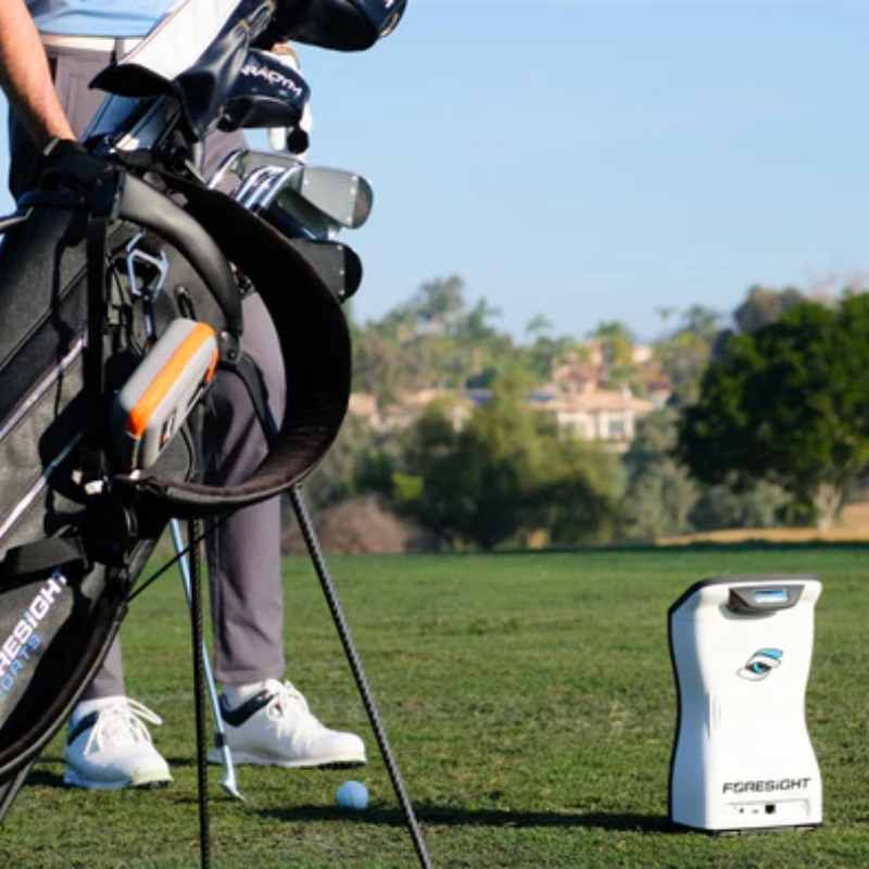 Foresight Sports QuadMAX Launch Monitor with golf bag.