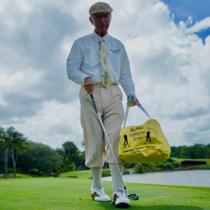 Golf Impact Bag® by Dr. Gary Wiren and golfer with club.