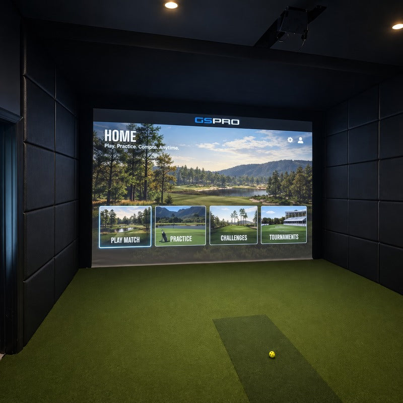 Golf Simulator Installation by Indoor Golf Outlet: a finished built-in simulator room with padded walls and a ceiling-mounted projector.