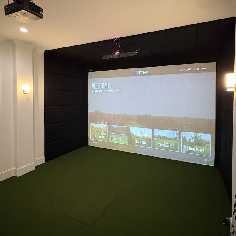 Golf Simulator Installation by Indoor Golf Outlet: a finished padded simulator bay with the projector mounted on the ceiling.