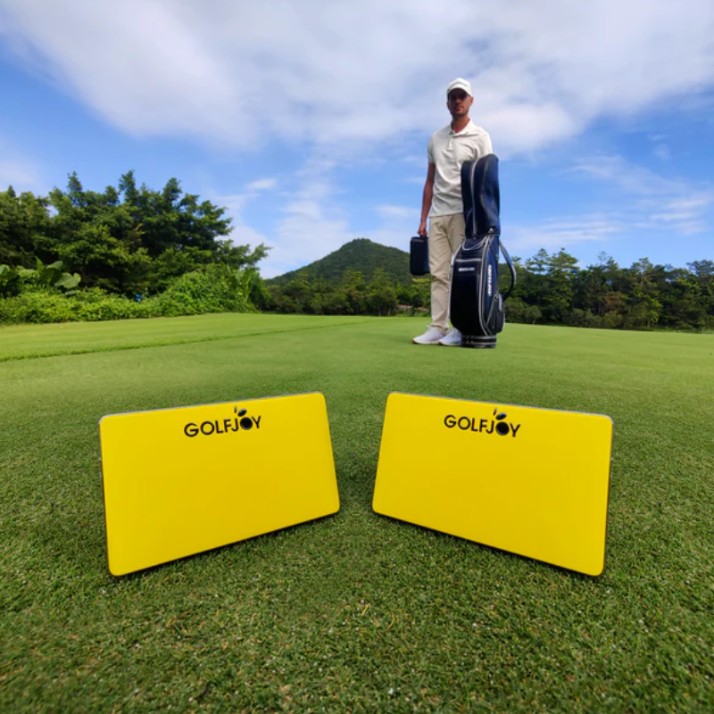 GolfJoy Golf Waver yellow displayed on golf course.