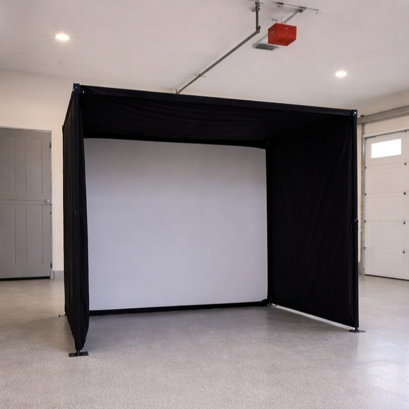 Impact Sports Foldable Golf Simulator Enclosure set up for play in a garage.