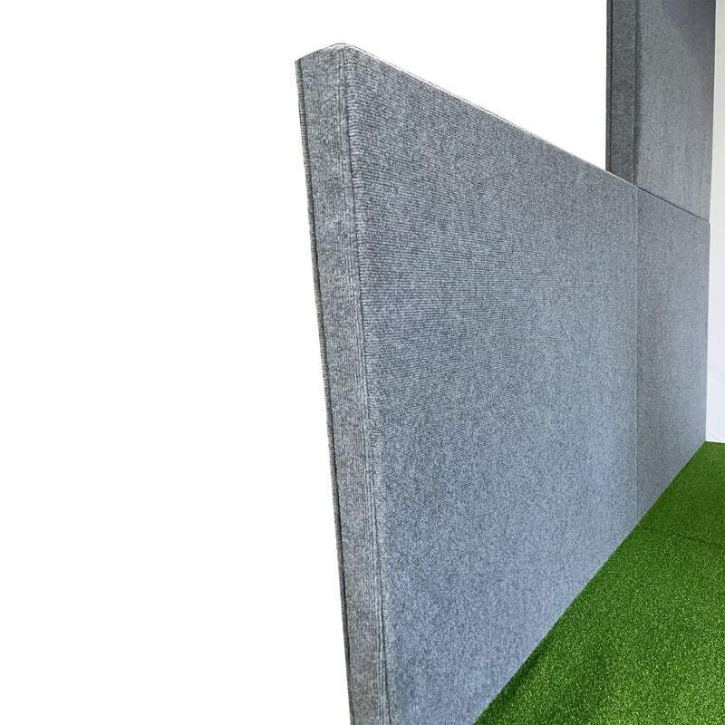 Impact Sports Modular Golf Simulator Enclosure padded side wall panel edge and turf floor detail.