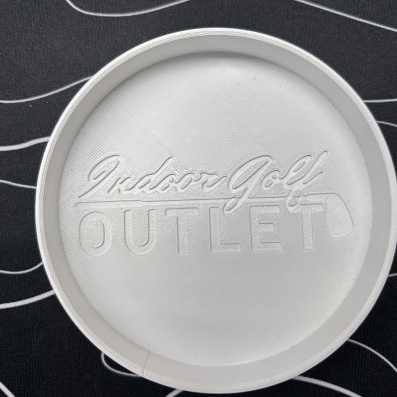 Indoor Golf Outlet Putting Cup top view with debossed logo.