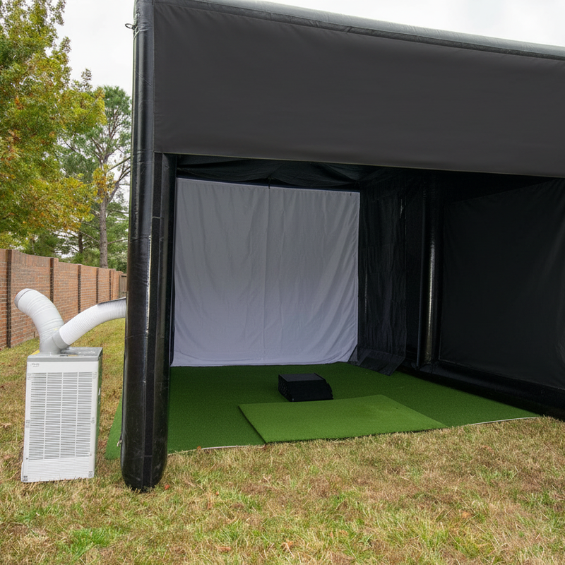 Inflatable golf simulator enclosure 12x16 impact screen and portable air conditioner.