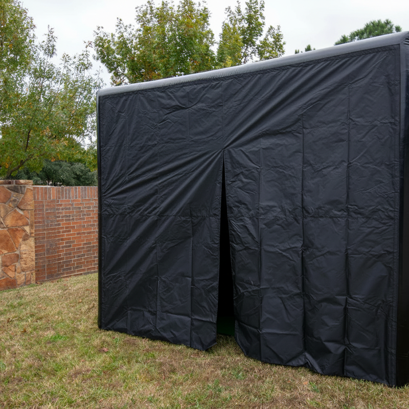 Inflatable golf simulator enclosure 12x16 rear blackout exterior view.