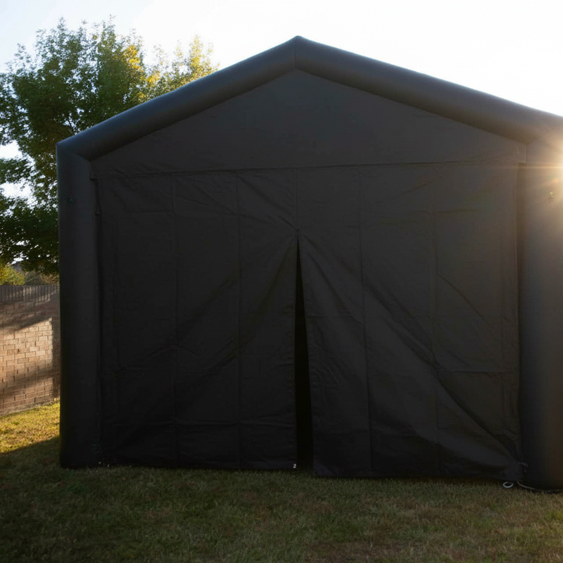 Inflatable golf simulator enclosure 16x16 front curtain closed exterior.