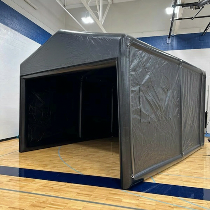 Inflatable golf simulator enclosure 16x20 indoor gymnasium front view.