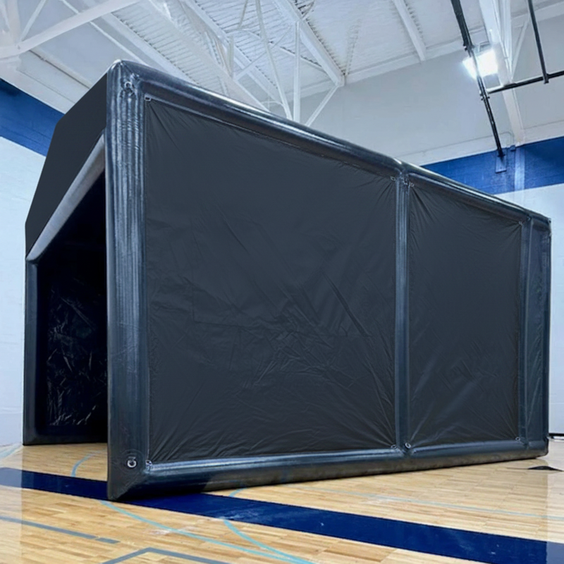 Inflatable golf simulator enclosure 16x20 indoor installation side view.