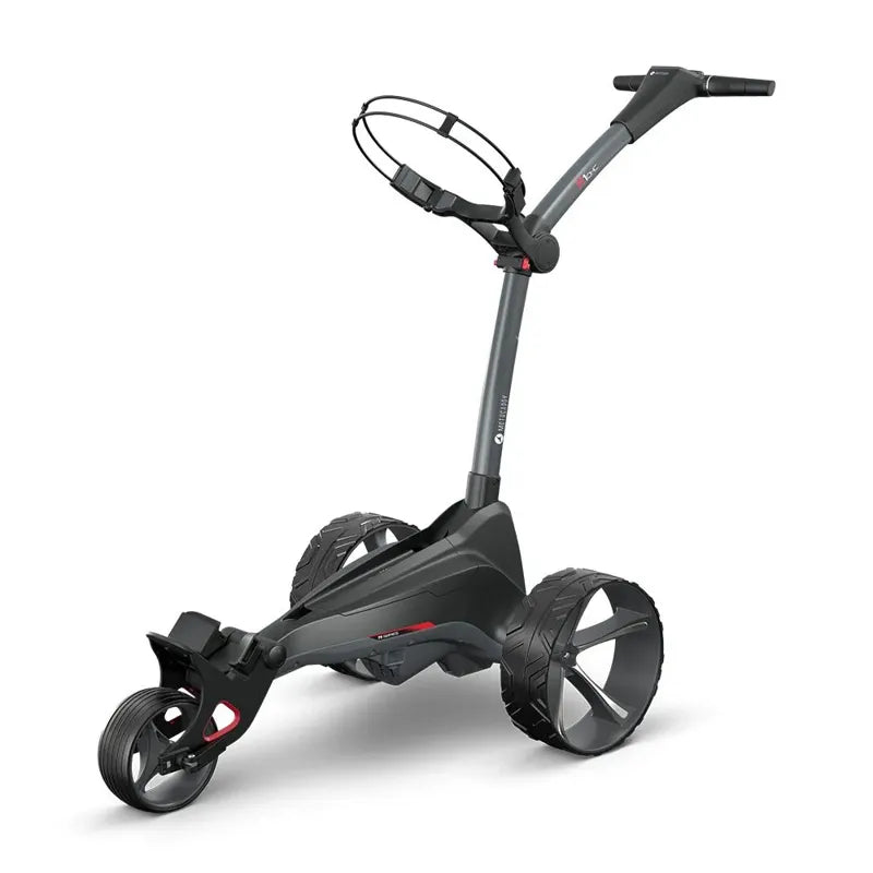 Motocaddy NEW M1 DHC Electric Caddy side angle black frame with large wheels red trim.
