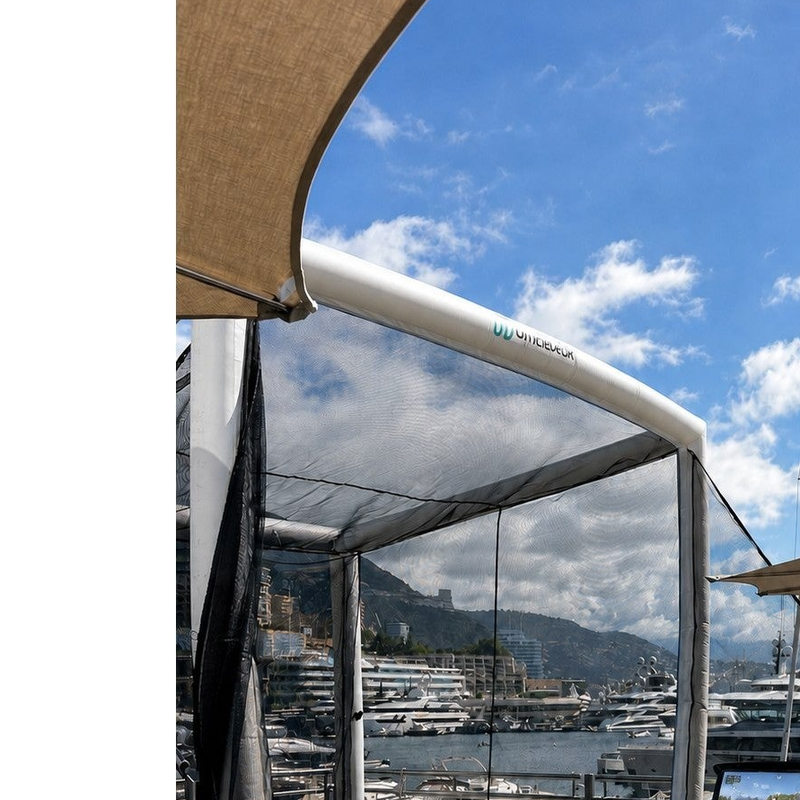 Off the Deck Cube Inflatable Golf Practice Net hitting station on a yacht deck with the simulator screen and net behind.