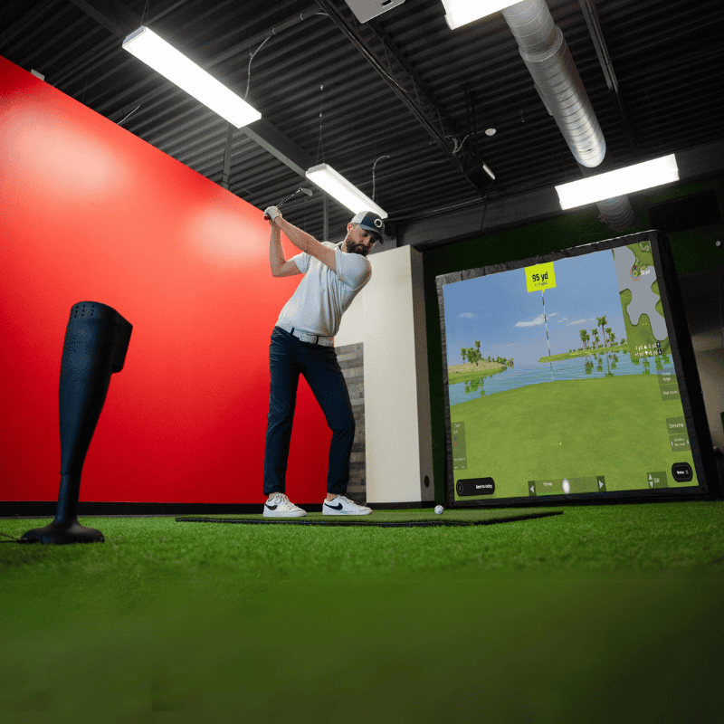 OptiShot Nova Series Golf In A Box 3 Simulator 5x4 mat with golfer.