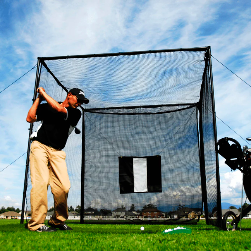Parbuster Bentley Golf Driving Range Net outdoors with golfer swinging.