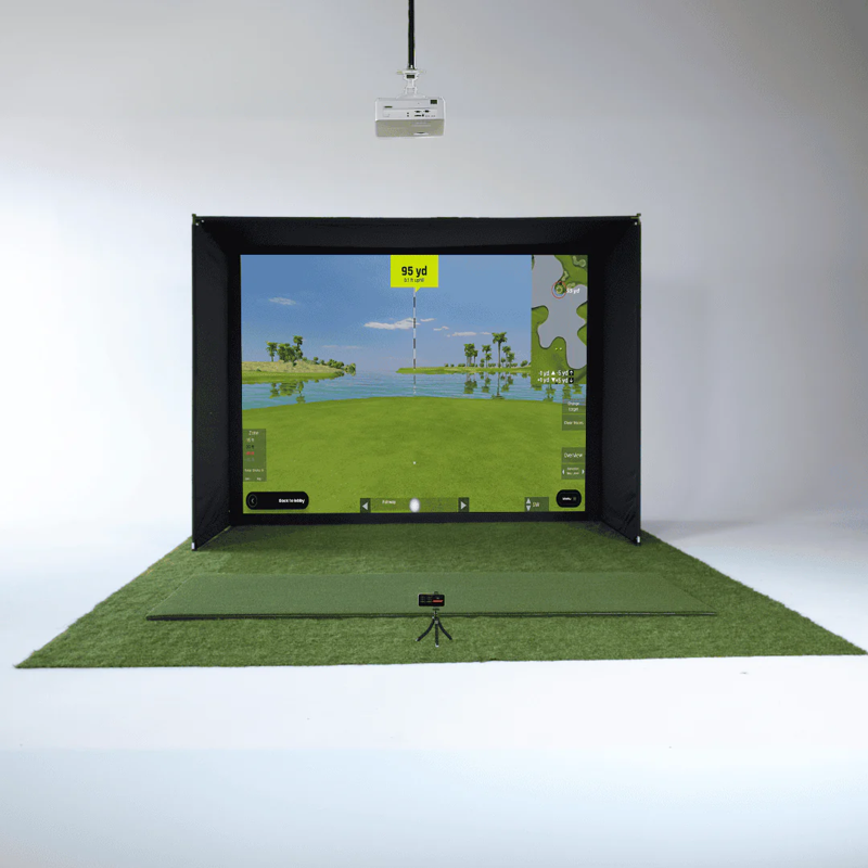 Red Stakes Golf Mobile Golf Studio Bundle full view golf simulator with projector setup at 95 yard target.