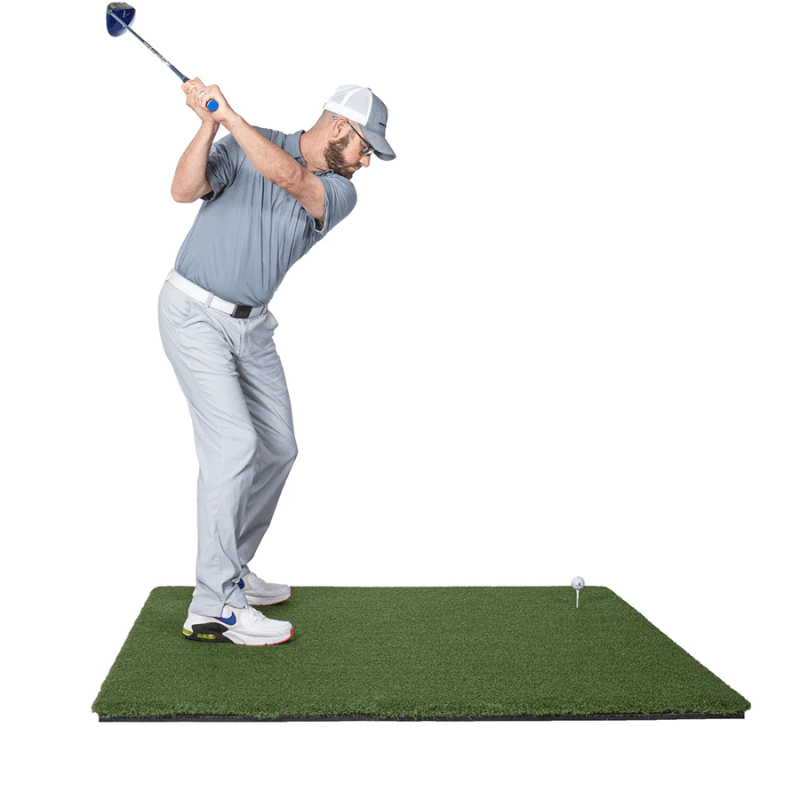 SIG Fairway Series Golf Mat with golfer taking backswing.