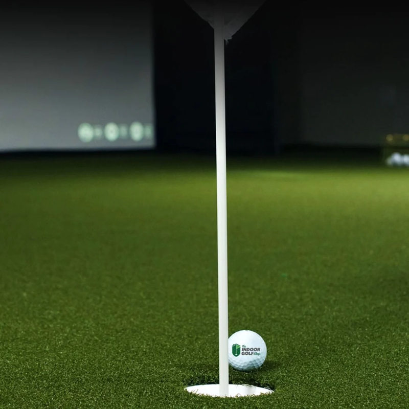 SIG Money Putt Golf Turf with cup and golf ball.