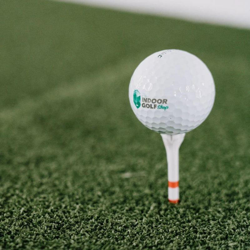 SIGPRO Softy 4 x 7 Golf Mat softy ball on tee.