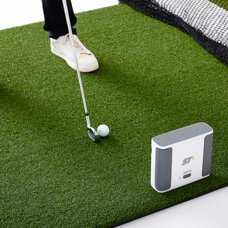 SkyTrak+ Launch Monitor with 5x5 Hitting Mat and golfer.