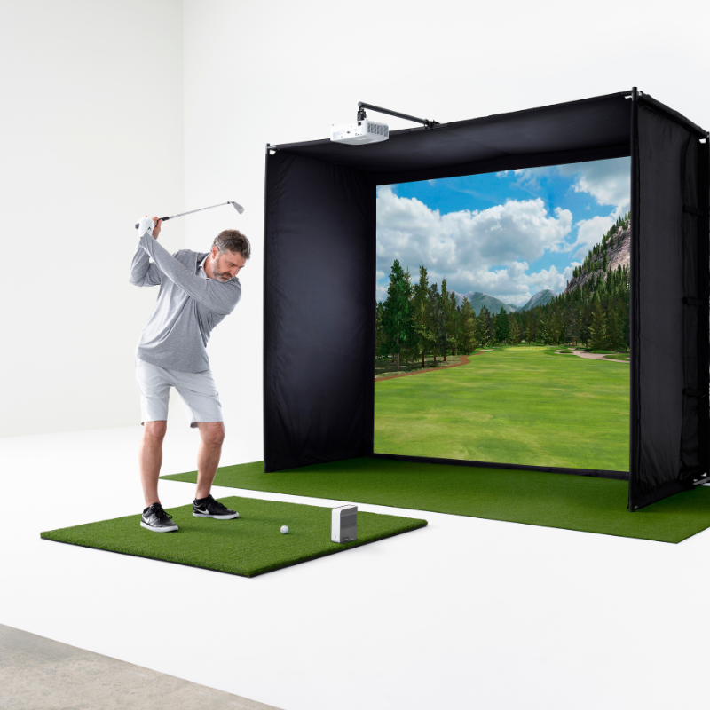 SkyTrak Launch Monitor with simulator and golfer.