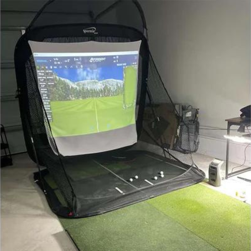 Spornia Golf Simulator Target Sheet affixed to SPG Golf Net with projector image on screen.