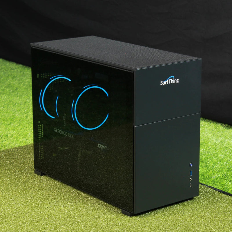 SurfThing SG3-5602 Golf Simulator Computer angled front view on grass.