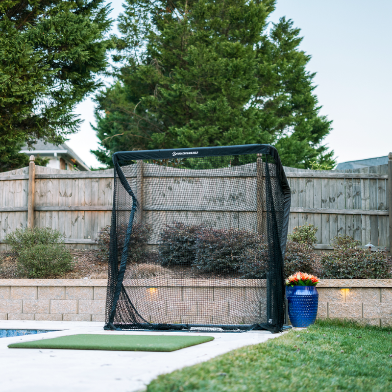 SwingNet Pro Golf Net front view with SwingTurf Golf Hitting Mat.