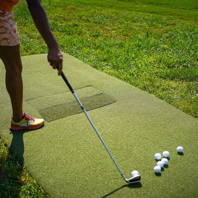 The Country Club Centerstrike Golf Mat by Real Feel Golf Mats close up in use.