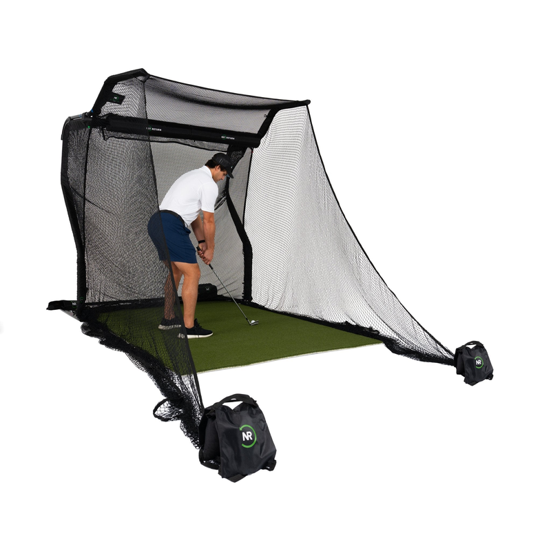 The Net Return No Fly Zone Package golfer practicing in the Home Series net.