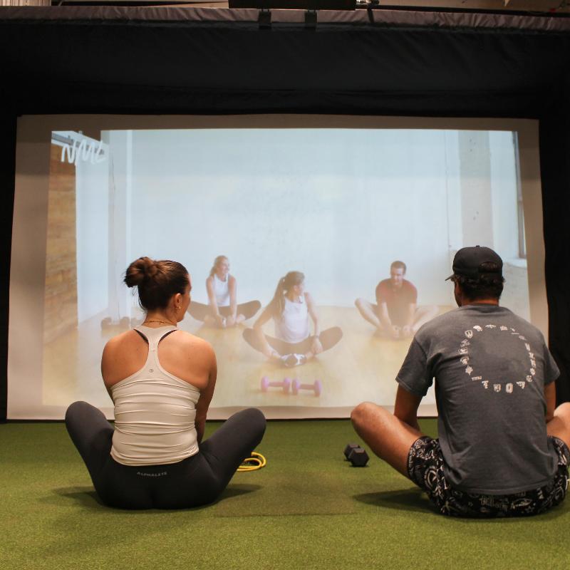 The SportScreen Parlour 16H Golf Simulator Enclosure using parlour 16 as exercise space.