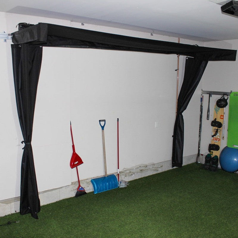 The SportsScreen Vanish LITE Series Golf Simulator Enclosure garage with side screens pinned.