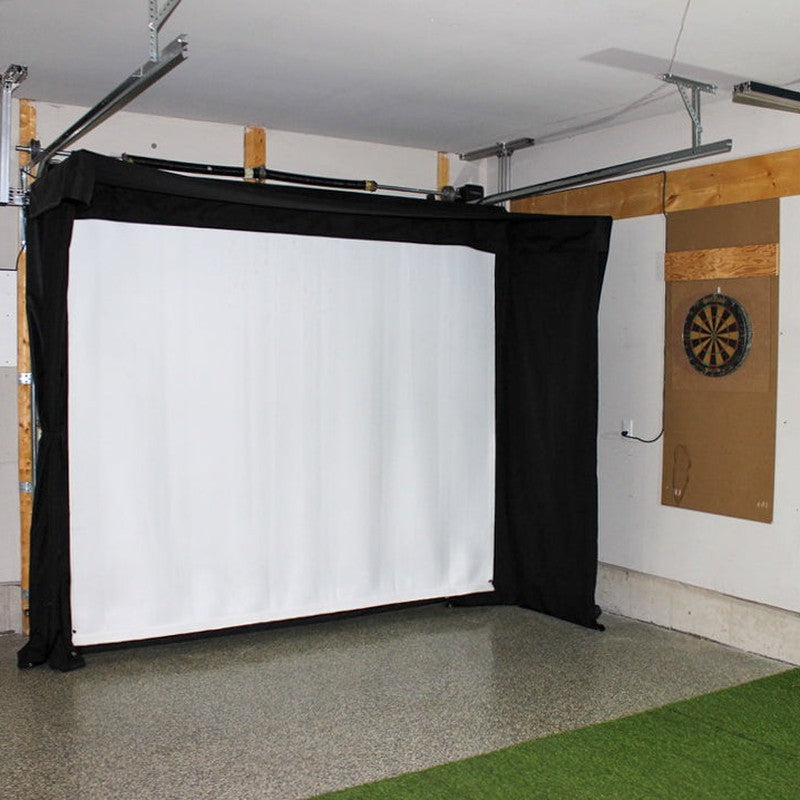 The SportsScreen Vanish LITE Series Golf Simulator Enclosure mounted around garage rails.