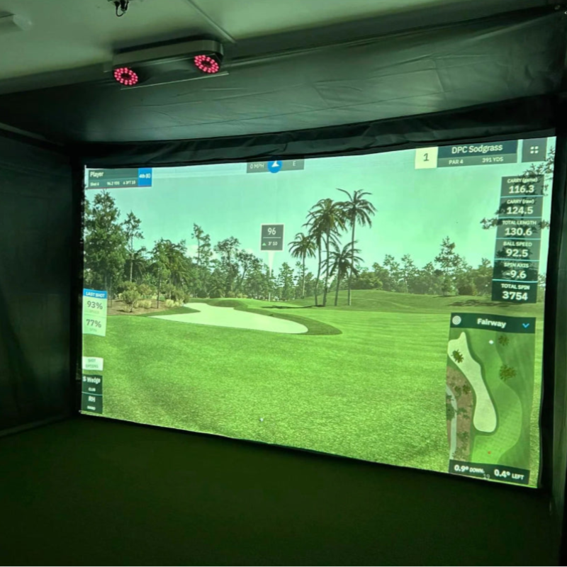 The SportsScreen Vanish Series Golf Simulator Enclosure golf sim mounted inside garage rails.