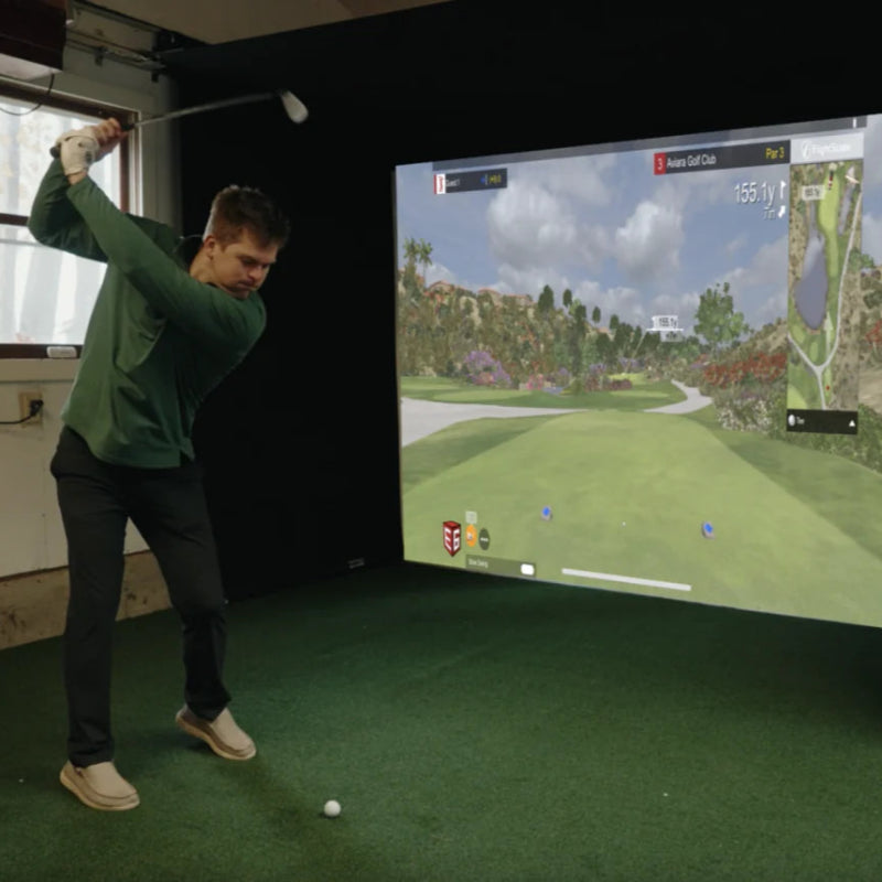 The SportsScreen Vanish Series Golf Simulator Enclosure setup inside garage.