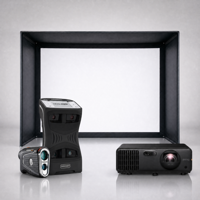 Foresight Sports QuadMAX launch monitor package hero image showing the SIG DIY Golf Simulator Enclosure with a BenQ short-throw projector on a grey studio background.