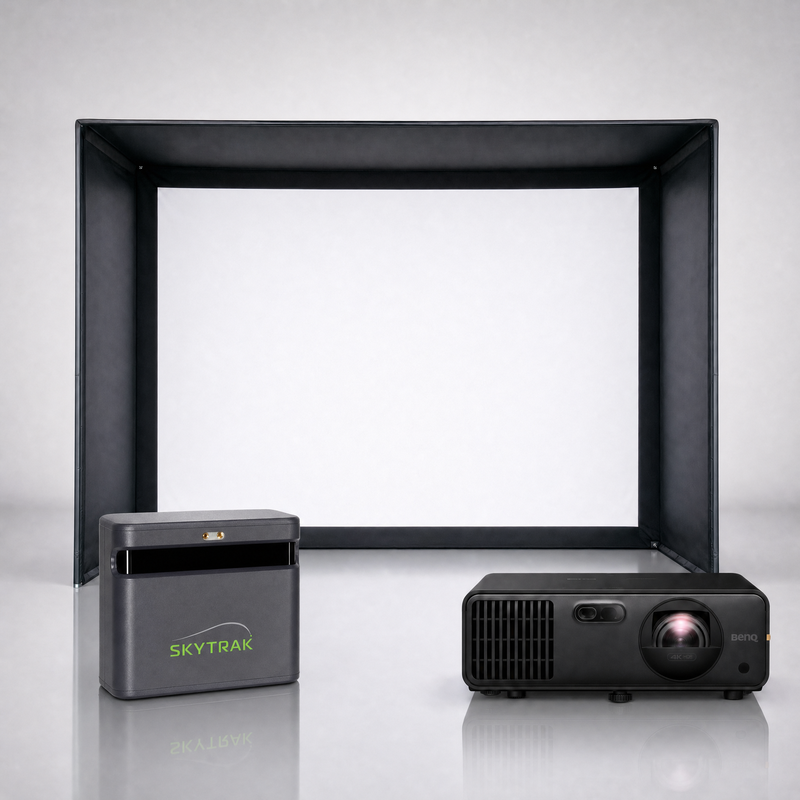 SkyTrak ST MAX launch monitor package hero image showing the SIG DIY Golf Simulator Enclosure with a BenQ short-throw projector on a grey studio background.